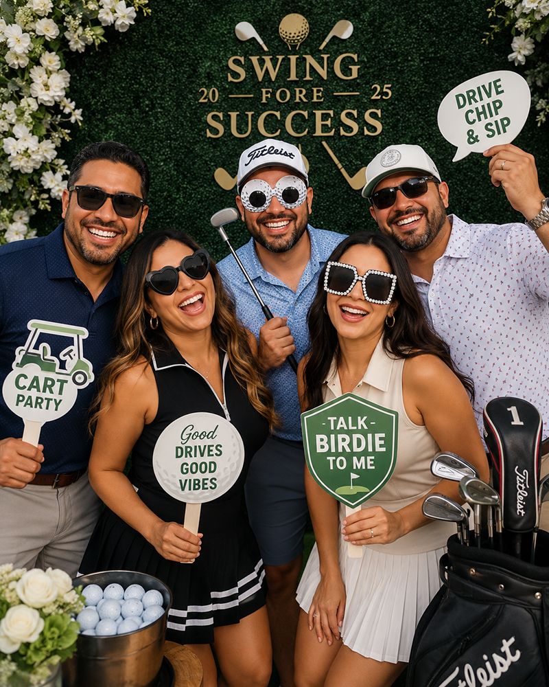 Guests posing at a golf tournament photo booth